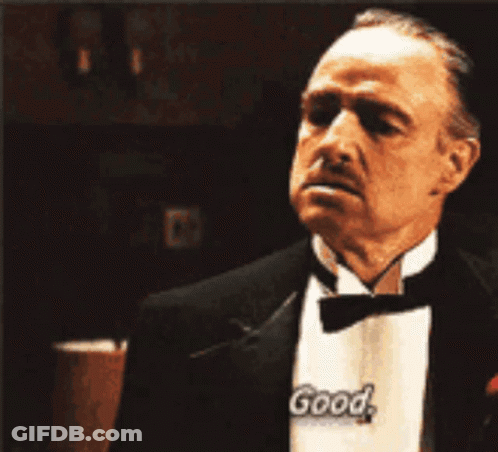 Man In Tuxedo With Ring Looking At Something GIF