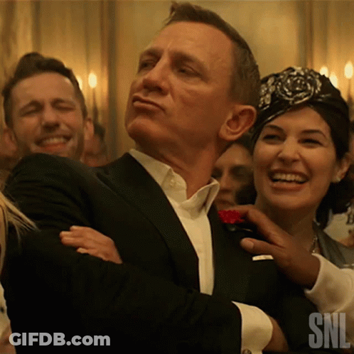 Man In Tuxedo With SNL Logo GIF