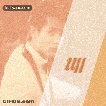 Man In Tuxedo With UI Sign GIF