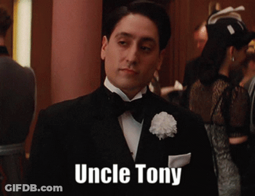 Man In Tuxedo With Uncle Tony Text GIF