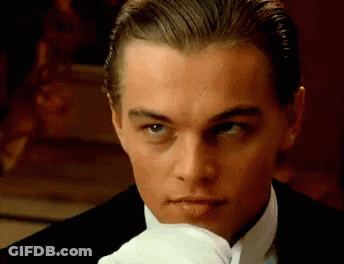 Man In Tuxedo With White Gloves Close Up GIF