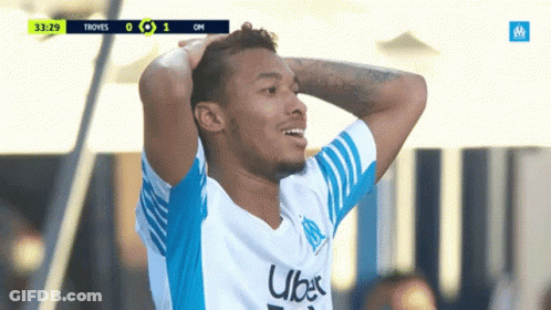 Man In Uber Shirt Holding Head GIF