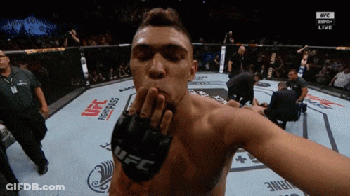 Man In UFC Glove Blows Kiss In Boxing Ring GIF