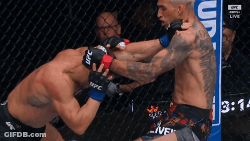 Man In UFC Glove Fighting Another GIF