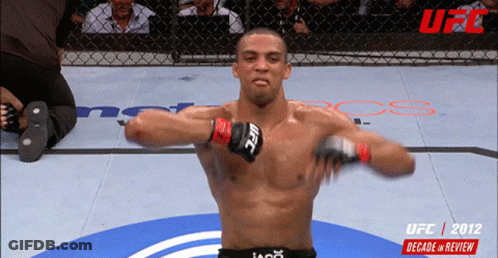 Man In UFC Glove Standing In Ring GIF