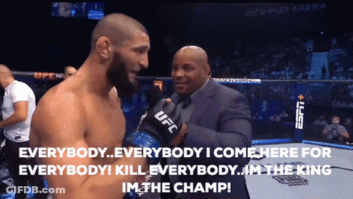 Man In UFC Glove Talking To Suit GIF
