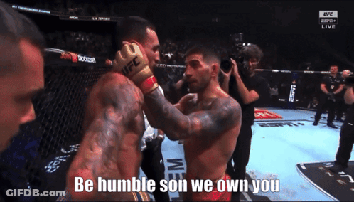 Man In UFC Glove Talks To Man In Boxing Ring GIF