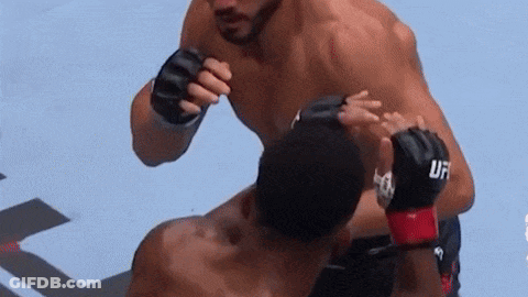 Man In UFC Gloves Fighting Another Man GIF