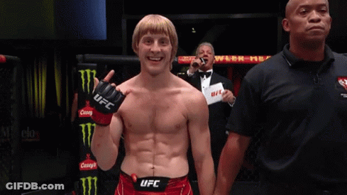 Man In UFC Gloves Next To Referee GIF