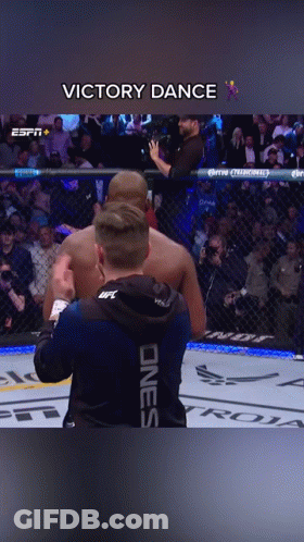 Man In UFC Hoodie Next To Cage GIF