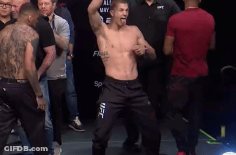 Man In UFC Pants Standing Before Crowd GIF