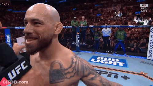 Man In UFC Ring With Bud Light Sign GIF