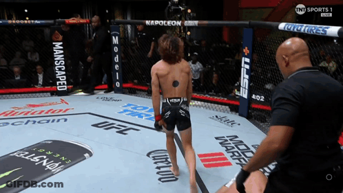 Man In UFC Ring With Monster Can GIF