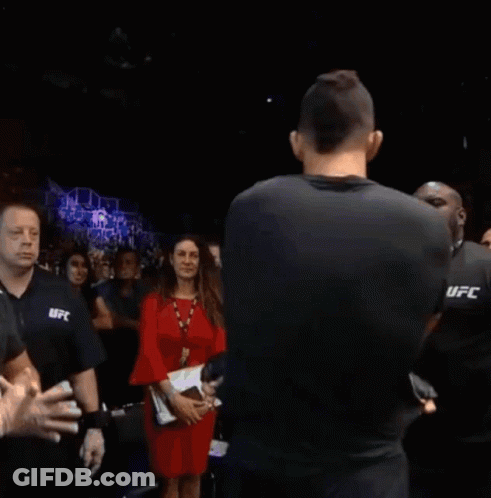 Man In UFC Shirt Next To Shirtless Man GIF