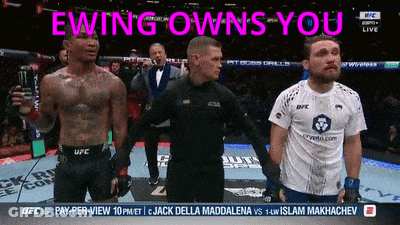 Man In UFC Shirt Standing Before Referee GIF