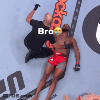 Man In UFC Shorts Lying Down GIF