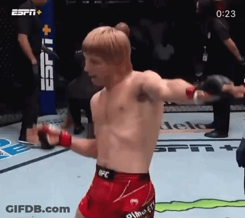 Man In UFC Shorts Standing In Ring GIF