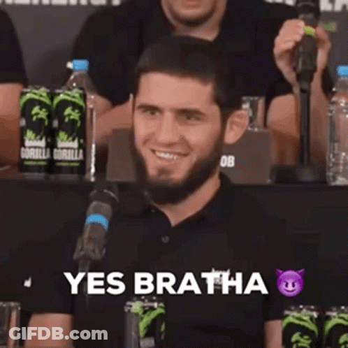 Man In UFC Shorts With Flames In Hands GIF