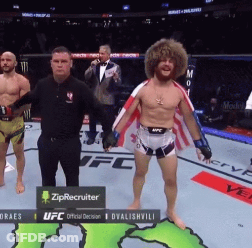 Man In UFC Uniform On Boxing Ring GIF