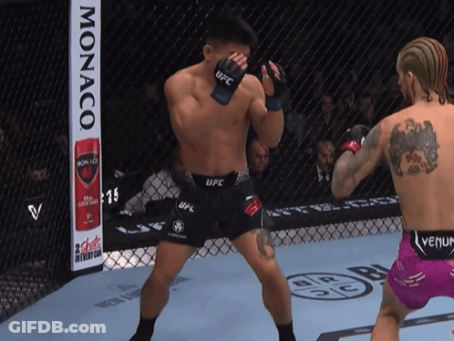 Man In UFC Uniform With Monaco Can GIF