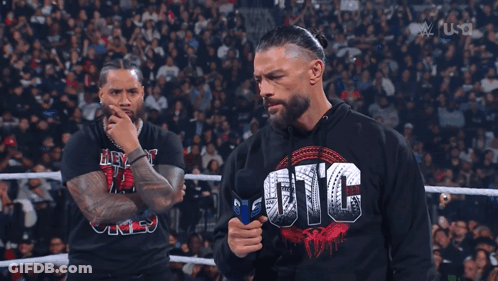 Man In UIC Sweatshirt In Wrestling Ring GIF