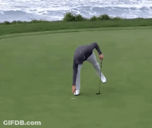 Man In Under Armour Holding Golf Club GIF