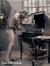 Man In Underwear Standing By Grill GIF