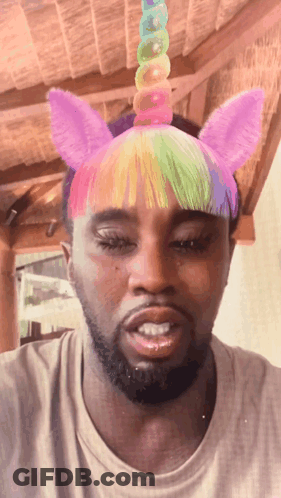 Man In Unicorn Headband With Rainbow Mane GIF