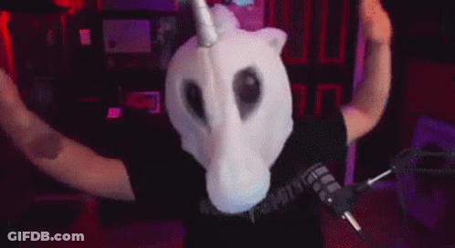 Man In Unicorn Mask At Microphone GIF