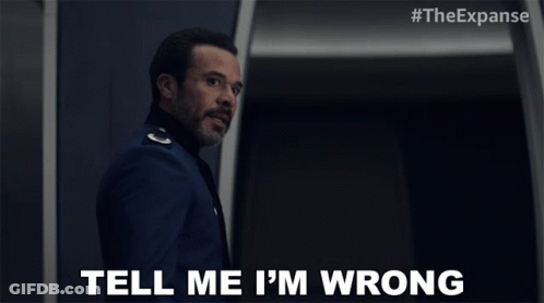 Man In Uniform Says Tell Me I'm Wrong In Front Of Door GIF
