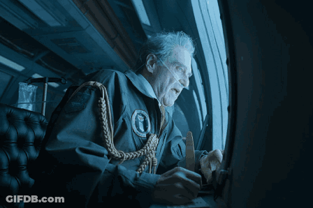 Man In US Air Force Uniform Looking Out Window GIF