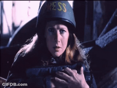 Man In US Helmet Talks To Woman GIF