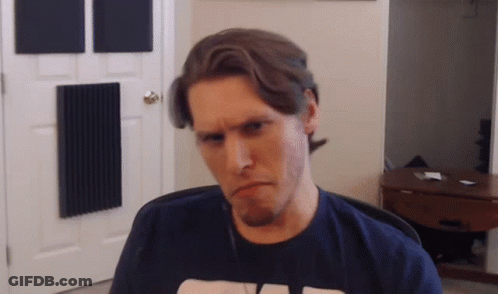 Man In V T-Shirt Making Funny Face GIF