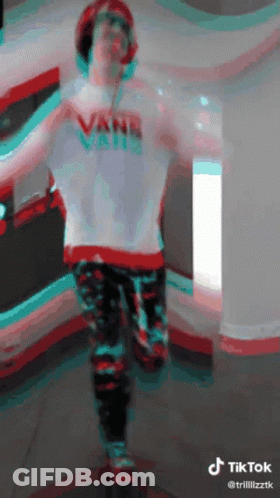 Man In Vans Shirt Dancing GIF