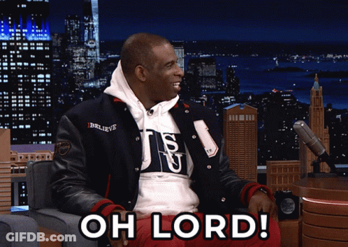 Man In Varsity Jacket Saying Oh Lord At Mic GIF