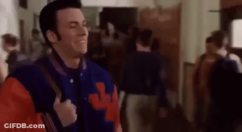 Man In Varsity Jacket Walking GIF