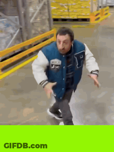 Man In Varsity Jacket With Letter P GIF