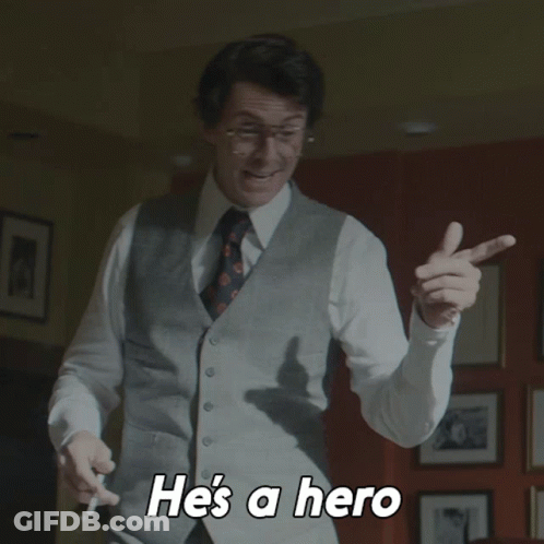 Man In Vest And Tie Saying He's A Hero GIF