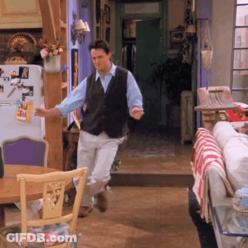 Man In Vest Dancing In Room GIF