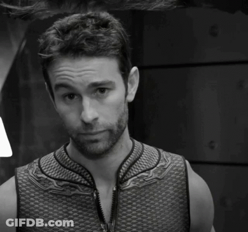 Man In Vest In Black And White GIF