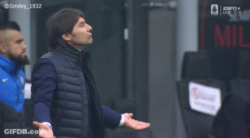 Man In Vest In Front Of ESPN Sign GIF