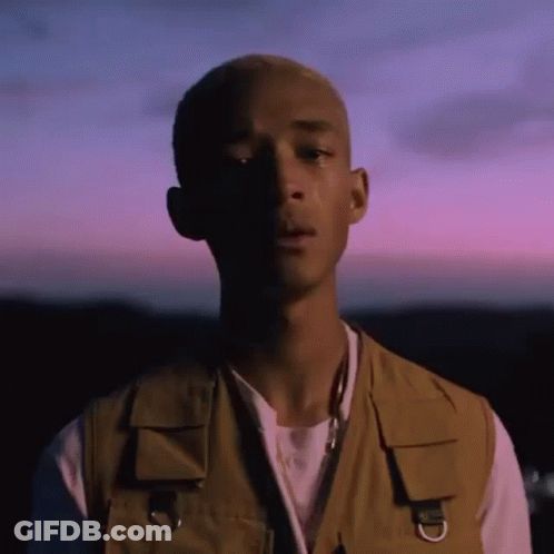 Man In Vest Purple Sky GIF