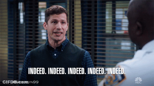 Man In Vest Saying Indeed GIF