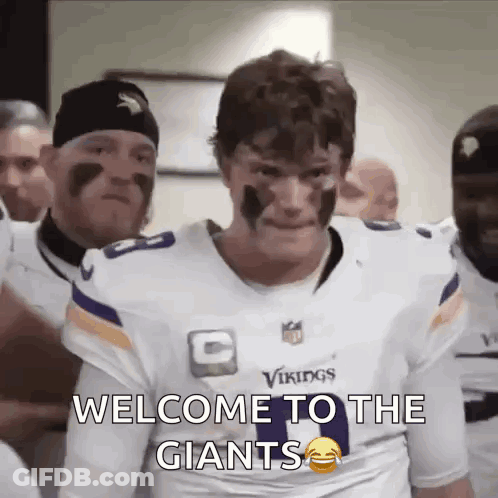 Man In Vikings Jersey Saying Welcome To The Giants GIF