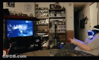 Man In Virtual Reality Headset Playing Video Game GIF