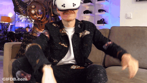 Man In VR Headset Sitting In Chair GIF
