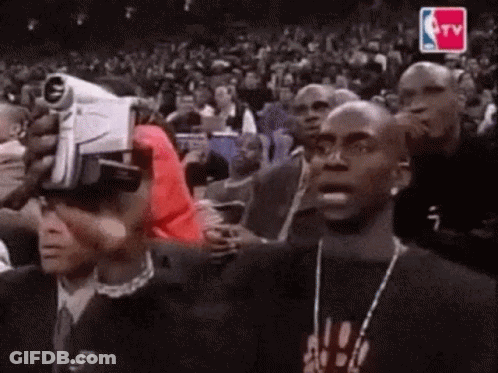 Man In VR Headset Watching Basketball Game GIF