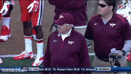 Man In VT Shirt With Football Players GIF