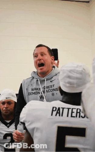 Man In Wake Forest Demon Deacons Sweatshirt Talks To Team GIF