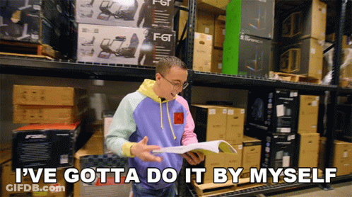 Man In Warehouse Reading Book Says I've Gotta Do It By Myself GIF